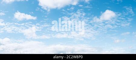 Panoramic blue sky background with white clouds Stock Photo