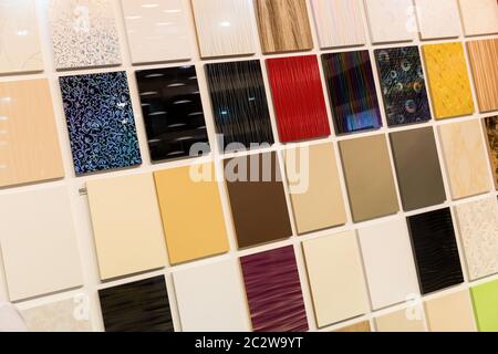 Samples of a ceramic tile in shop on the wall Stock Photo