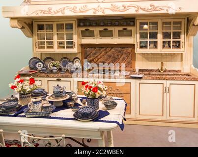 Luxury kitchen made from light wood with kitchen tools Stock Photo