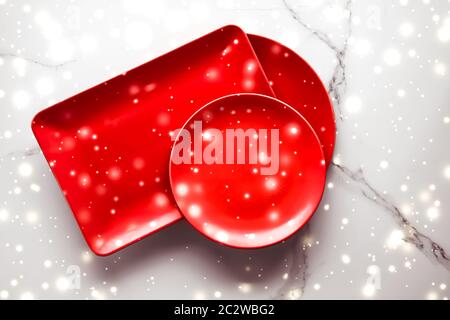 Red empty plate on marble table flatlay background, tableware decoration for romantic holiday dinner in Christmas time and Valen Stock Photo