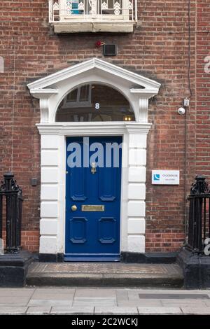 Traditional Old Blue Front Door Of A Brick House In Dublin Ireland Stock Photo