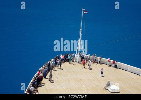 Cruise Ship Passengers On The Forward Deck Looking At The Entry To Hamilton Bermuda Stock Photo