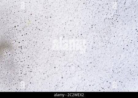 surface covered with soap foam. grunge background Stock Photo