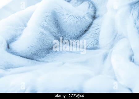 Luxury blue fur coat texture background, artificial fabric detail Stock Photo