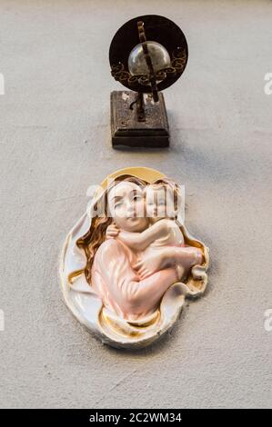Religious icon. On stone wall of Virgin Mary Stock Photo