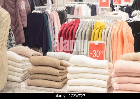 Label with discount on clothing.Sale of clothes with 30 percent discount in the store or shopping centre Stock Photo