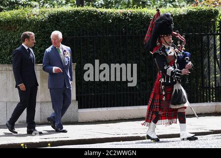 The Prince of Wales with French president Emmanuel Macron attending a ceremony at Carlton Gardens in London during his visit to the UK. Stock Photo