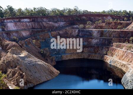 Open cut gold mining complex in Peak Hill, New South Wales, Australia. Pictured is the open cut mine named 'Proprietary' within the complex. Stock Photo