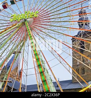 All Hallows funfair with illuminated ferris wheel in the old city, Soest, Germany, Europe Stock Photo