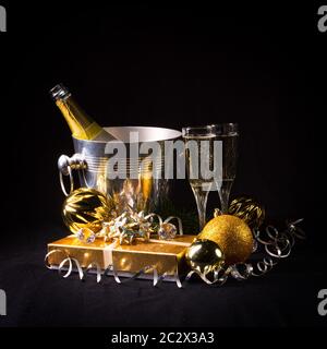 New Year's motives - clock, glasses and confetti Stock Photo