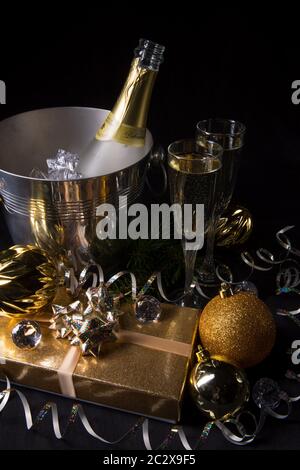 New Year's motives - clock, glasses and confetti Stock Photo