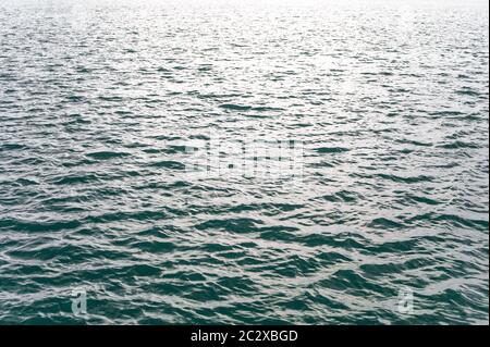 Blue and turquoise water with irregular wave structure Stock Photo