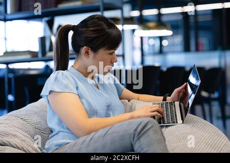 Asian businesswoman wearing working in a modern office Stock Photo