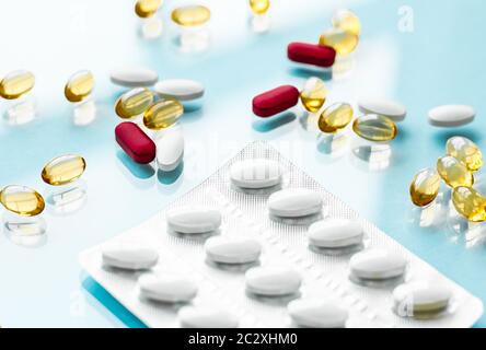 Pills and capsules for diet nutrition, anti-aging beauty supplements, probiotic drugs, pill vitamins as medicine and healthcare Stock Photo