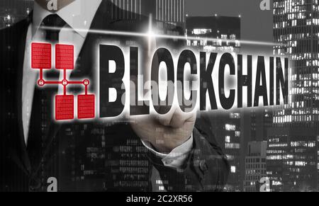 Blockchain is shown by businessman concept. Stock Photo