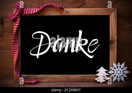 Chalkboard With German Calligraphy Danke Means Thank You. Christmas 