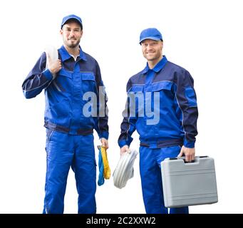 Portrait Of A Smiling Young Male Electrician Holding Kit And Rope Against White Background Stock Photo