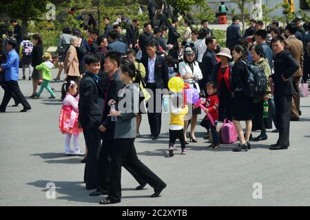 Pyongyang, North Korea - May 1, 2019: People gather to celebrate May 1st Labor Day on the Pyongyang street Stock Photo