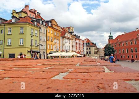 Warsaw square panorama from red brick surface. Touristic place in center of old city of Warsaw Stock Photo