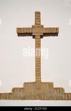 Christian Cross of bricks Stock Photo