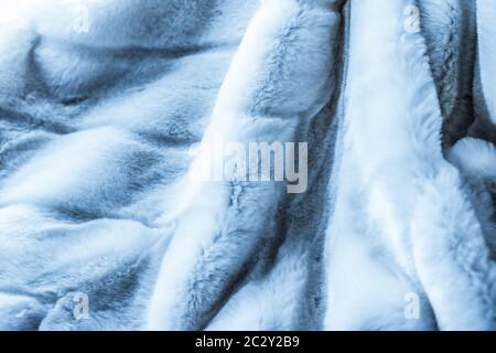 Luxury blue fur coat texture background, artificial fabric detail Stock Photo
