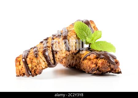 Cereal bars with peanuts and chocolate isolated on white background. Stock Photo