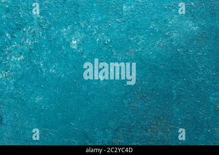 grungy stucco wall background paited blue with white patterns Stock Photo