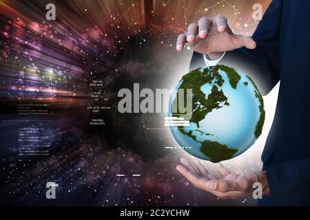 businessman hand showing digital planet Stock Photo