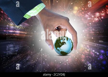 businessman hand showing digital planet Stock Photo