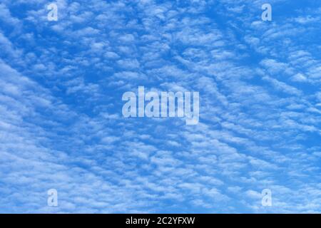 Little rare clouds in the blue sky Stock Photo