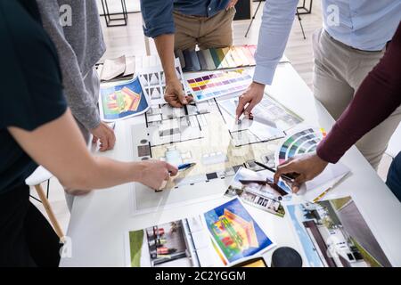 Architects And Designers Working On Color Selection For House Stock Photo