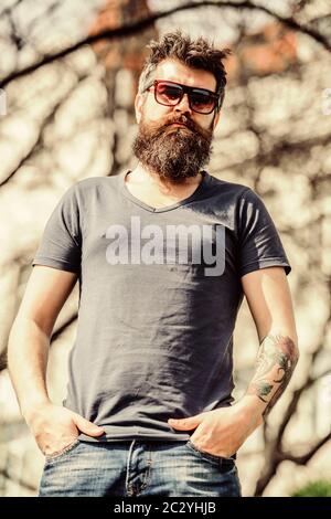 UV filter. Bearded hipster brutal man wear protective sunglasses. Man  bearded with sunglasses nature background. Bearded man wear modern  fashionable sunglasses. Hipster confident in dark sunglasses Stock Photo -  Alamy