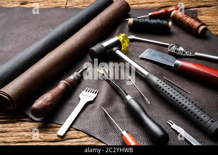Leather Craft Tools On Desk In Tailoring Workshop Stock Photo