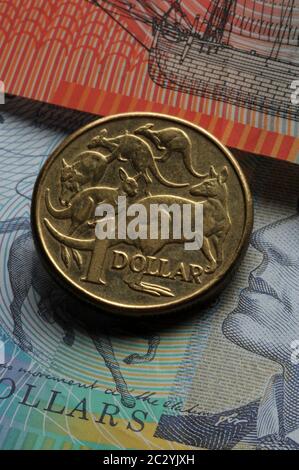 Australian banknotes with coins on top Stock Photo