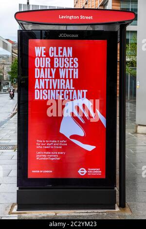 London, UK - June 17th 2020: A bus stop in London, UK, during the Coronavirus pandemic, displaying a sign informing commuters that the buses are clean Stock Photo