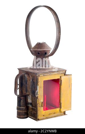 Old rusty railroad lantern. Isolated on white Stock Photo