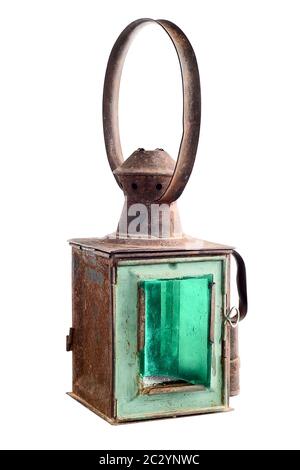 Old rusty railroad lantern. Isolated on white Stock Photo