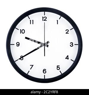 Classic analog clock pointing at nine forty, isolated on white background. Stock Photo