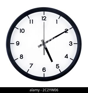 Classic analog clock pointing at five ten, isolated on white background. Stock Photo