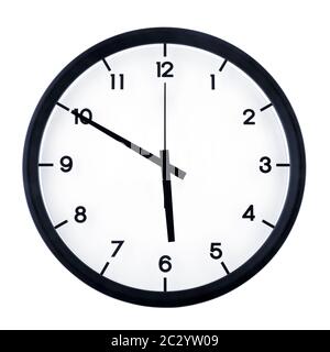 Classic analog clock pointing at five fifty, isolated on white background. Stock Photo