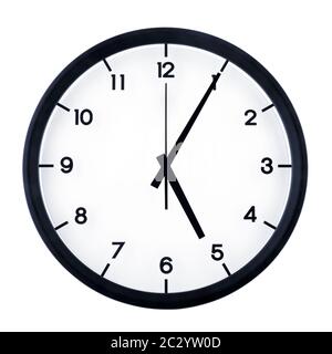 Classic analog clock pointing at five O five, isolated on white background. Stock Photo