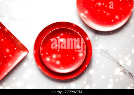 Red empty plate on marble table flatlay background, tableware decoration for romantic holiday dinner in Christmas time and Valen Stock Photo