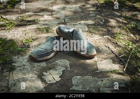 Old shoes. Retro background. dirty shoes. High quality photo Stock Photo
