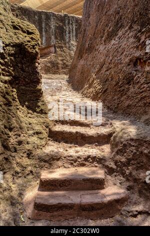 exterior labyrinths with stairs between LaLibela churches in Ethiopia carved out of the bedrock. UNESCO World Heritage Site, Lalibela Ethiopia, Africa Stock Photo