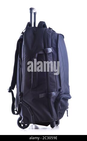 Large black tourist backpack with wheels isolated on white background Stock Photo