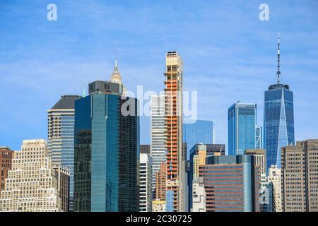 View from Pier 1 over the East River to the skyline of lower Manhattan, Dumbo, Downtown Brooklyn, Brooklyn, New York Stock Photo