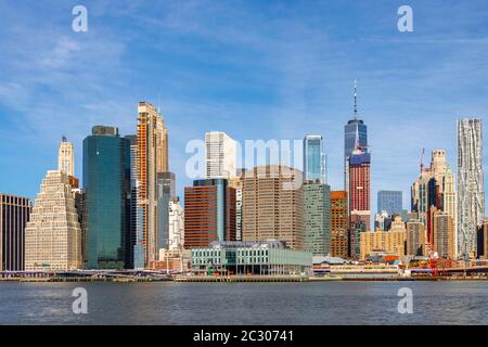 View from Pier 1 over the East River to the skyline of lower Manhattan, Dumbo, Downtown Brooklyn, Brooklyn, New York, USA Stock Photo
