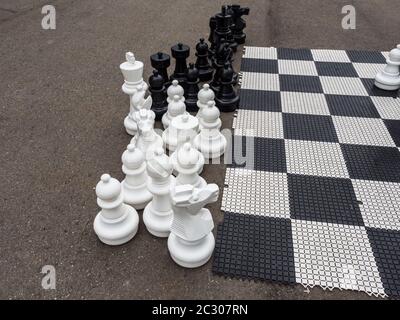 Large chess pieces for playing on the street. Rosa Khutor Stock Photo