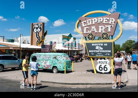 Old sign Copper Cart, old VW bus classic car, Historic Route 66, Seligman, Arizona, USA Stock Photo