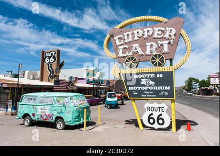 Old sign Copper Cart, old VW bus classic car, Historic Route 66, Seligman, Arizona, USA Stock Photo